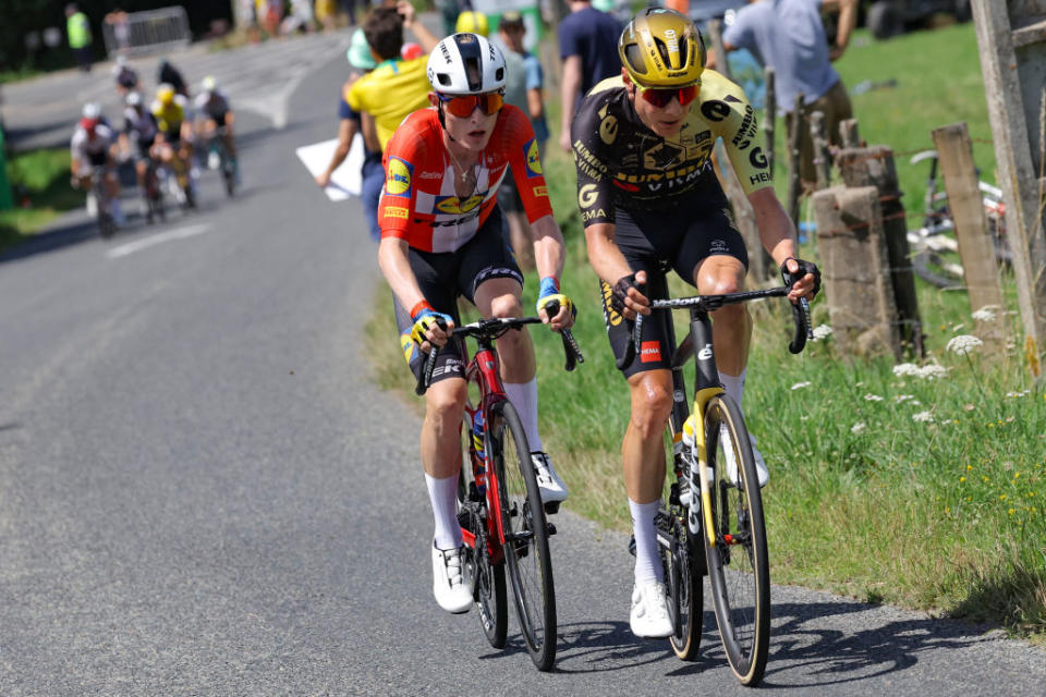 Jumbo-Visma's Dutch rider Wilco Kelderman (R) and Lidl - Trek's Danish rider Mattias Jensen Skjelmose (L) cycle ahead of the pack of riders during the 12th stage of the 110th edition of the Tour de France cycling race, 169 km between Roanne and Belleville-en-Beaujolais, in central-eastern France, on July 13, 2023. (Photo by Thomas SAMSON / AFP)