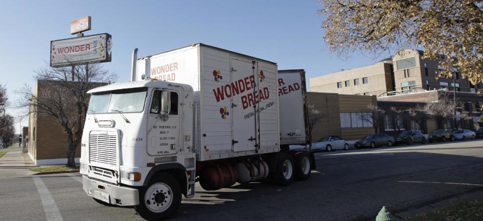 A Wonder Bread truck pulls out of the Utah Hostess plant in Ogden, Utah, Thursday, Nov. 15, 2012. Hostess Brands Inc. said it likely won't make an announcement until Friday morning on whether it will move to liquidate its business, after the company had set a Thursday deadline for striking employees to return to work. The maker of Twinkies, Ding Dongs and Wonder Bread said Thursday it will file a motion in U.S. Bankruptcy Court to shutter operations if enough workers don't return by 5 p.m. EST. That would result in the loss of about 18,000 jobs, including hundreds in Ogden. (AP Photo/Rick Bowmer)