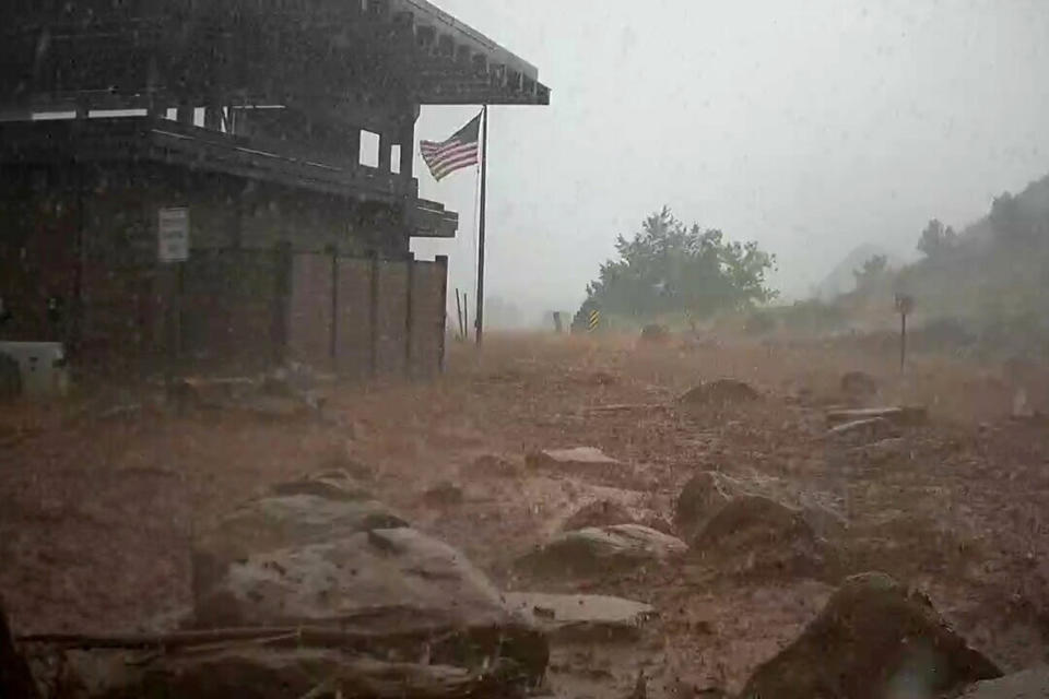 FILE - In this photo provided by the National Park Service is the scene of a flash flood in Zion National Park, Utah, on June 29, 2021. Authorities have been searching for days for Jetal Agnihotri, 29, of Tucson, Ariz., reported missing after being swept away by floodwaters in the park as strong seasonal rain storms hit parts of the U.S. Southwest. (National Park Service via AP, File)