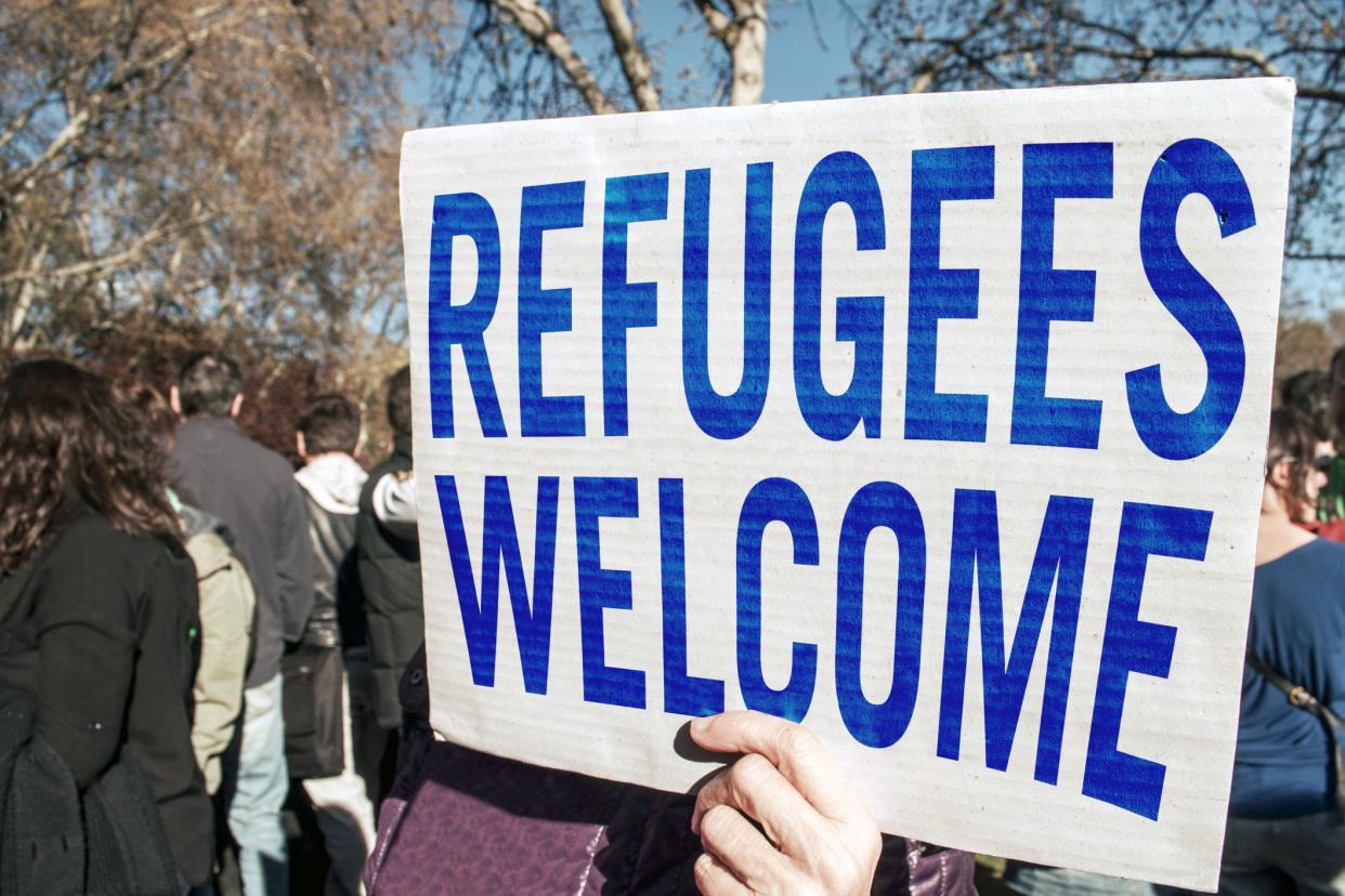 refugees welcome sign