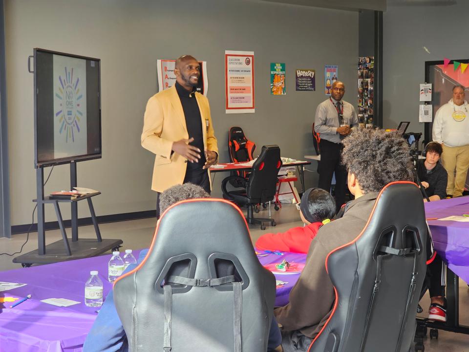 Pro Football Hall of Famer Isaac Bruce met with students at Crenshaw Middle School during the No One Eats Alone program. The program aims to break social isolation and teach kids how to build a culture of belonging.