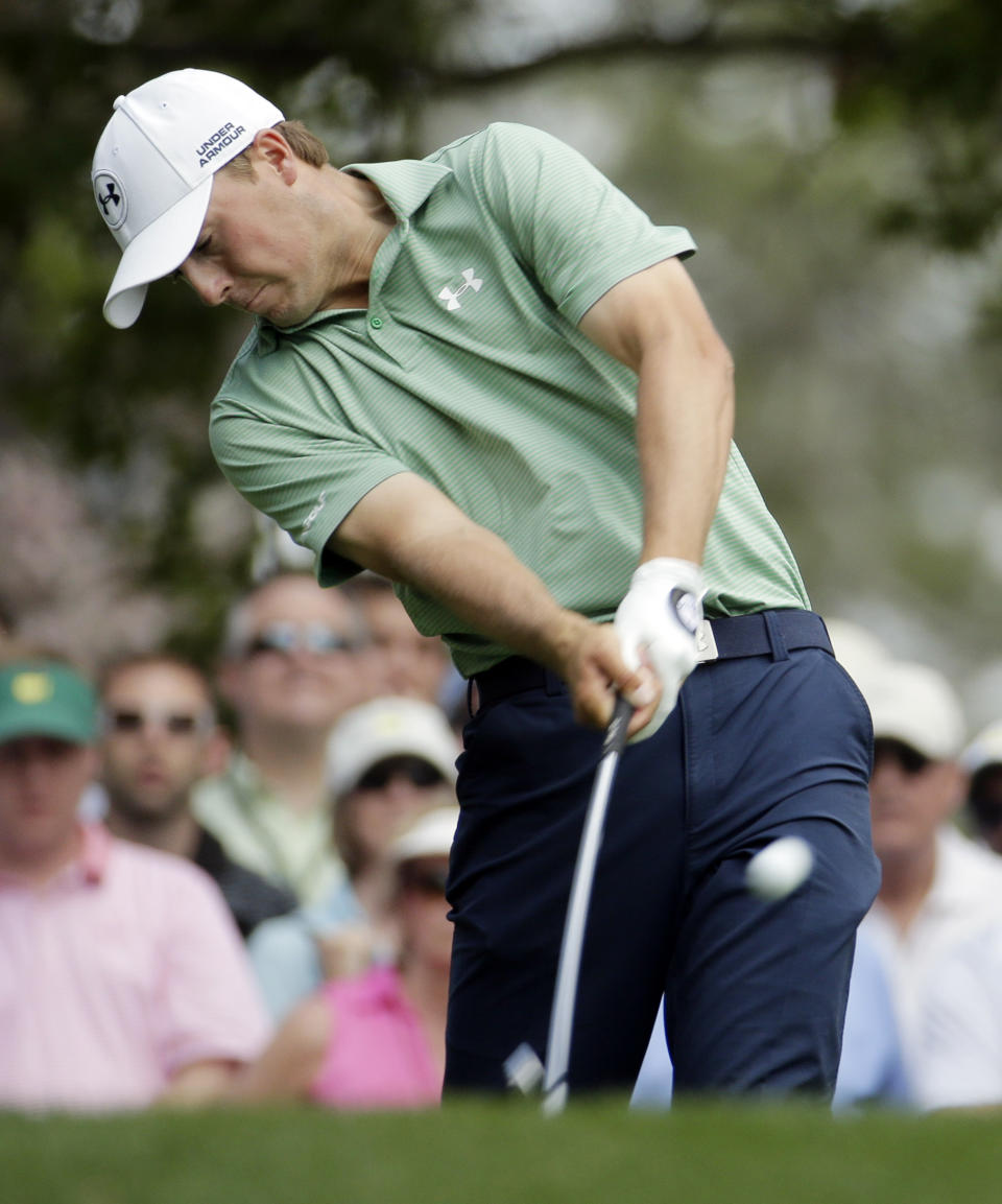 Jordan Spieth tees off on the fourth hole during the fourth round of the Masters golf tournament Sunday, April 13, 2014, in Augusta, Ga. (AP Photo/Charlie Riedel)