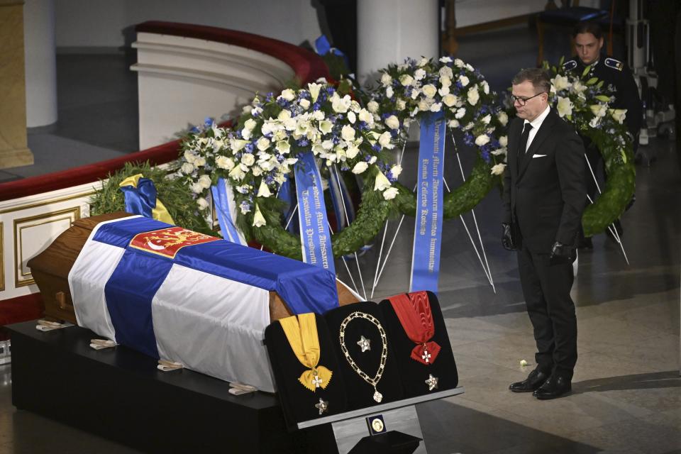 Prime minister Petteri Orpo of Finland pays respect by the coffin of former President of the Republic Martti Ahtisaari during the state funeral at the Helsinki Cathedral in Helsinki, Finland, Friday, Nov. 10, 2023. Foreign dignitaries gathered in Finland’s capital on Friday to bid farewell to former President Martti Ahtisaari, including leaders of countries where he helped reach peace accords. Ahtisaari, who was awarded the Nobel Peace Prize in 2008, died Oct. 16 at the age of 86. (Heikki Saukkomaa/Lehtikuva via AP)