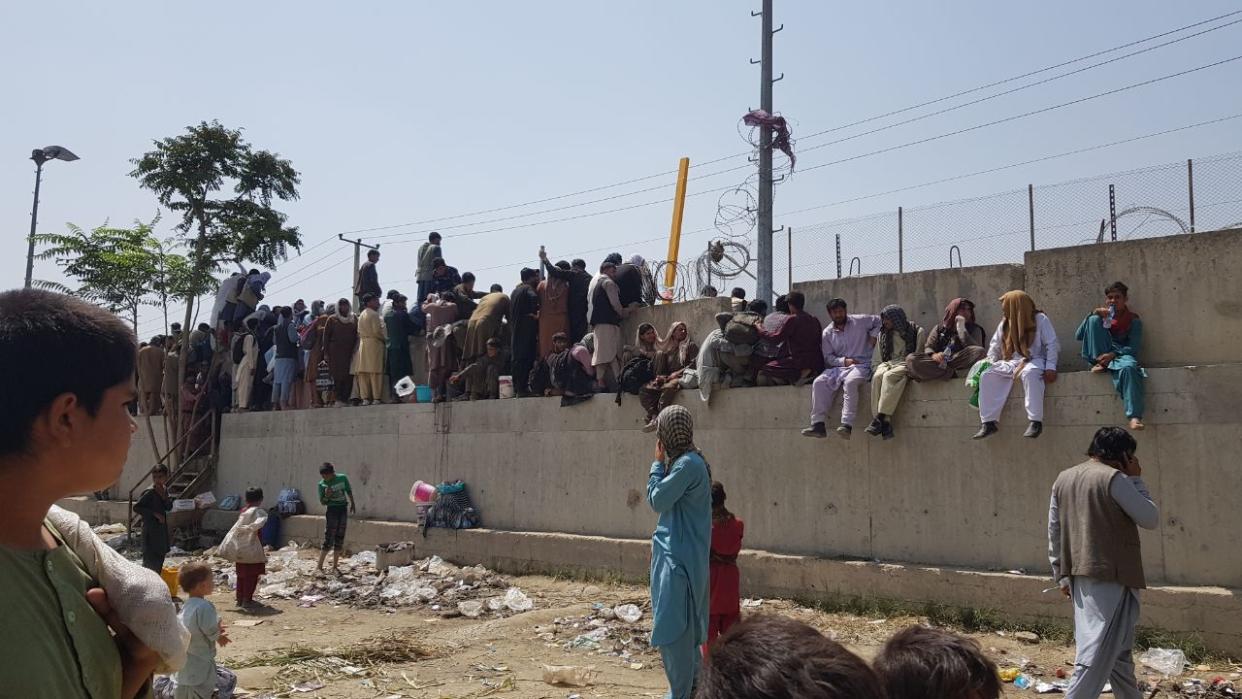 KABUL, AFGHANISTAN - AUGUST 23: People who want to flee the country continue to wait around Hamid Karzai International Airport in Kabul, Afghanistan on August 23, 2021. (Photo by Sayed Khodaiberdi Sadat/Anadolu Agency via Getty Images)