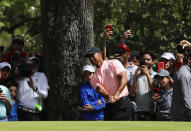 Tiger Woods follows his shot after hitting the ball at the 2nd hole on the second day of competition of the WGC-Mexico Championship at the Chapultepec Golf Club in Mexico City, Friday, Feb. 22, 2019. (AP Photo/Marco Ugarte)