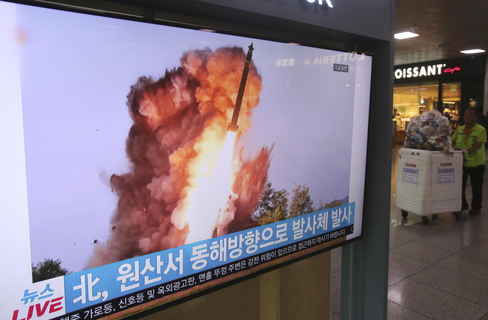 A TV screen shows a file image of a North Korea&#39;s missile launch during a news program at the Seoul Railway Station in Seoul, South Korea, Wednesday, Oct. 2, 2019. North Korea on Wednesday fired projectiles toward its eastern sea, South Korea&#39;s military said, in an apparent display of its expanding military capabilities ahead of planned nuclear negotiations with the United States this weekend. The sign reads: &quot; A projectile laugh from North Korea.&quot; (AP Photo/Ahn Young-joon)