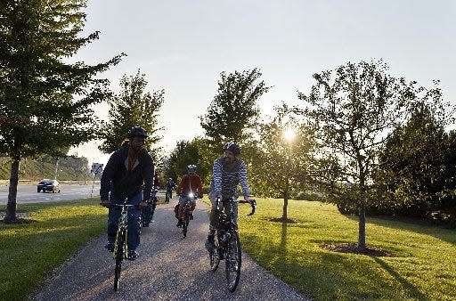 Bicyclists cruise along the Bayfront Parkway in this 2014 file photo.