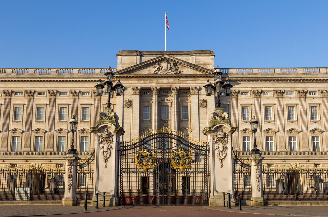 London, UK - 9th March 2014: The front of Buckingham Palce in the morning at sunrise with nobody around