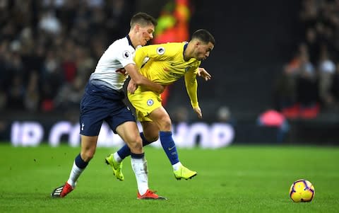 Eden Hazard of Chelsea is challenged by Juan Foyth of Tottenham Hotspur - Chelsea's penalty appeals weren't rewarded and the result of this challenge was an unhappy Hazard - Credit: Getty Images