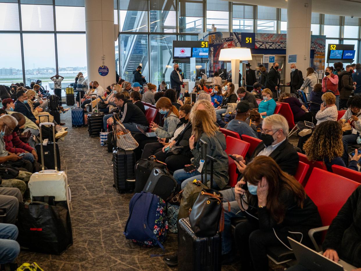 Passengers wait for boarding at LGA.