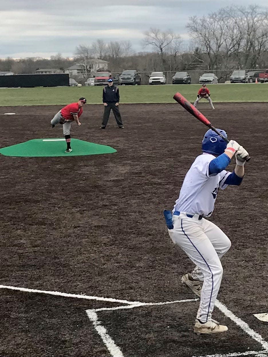 Highland's Kort Sears takes an at-bat against Marion Harding last year during a home baseball game.