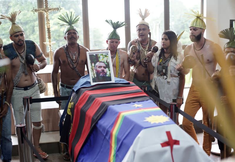 Xukuru indigenous people perform a ritual during the funeral of Brazilian indigenous expert Bruno Pereira in Recife