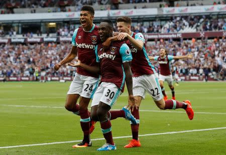 Britain Soccer Football - West Ham United v AFC Bournemouth - Premier League - London Stadium - 21/8/16 West Ham United's Michail Antonio celebrates scoring their first goal with Ashley Fletcher and Sam Byram Action Images via Reuters / Carl Recine Livepic EDITORIAL USE ONLY.