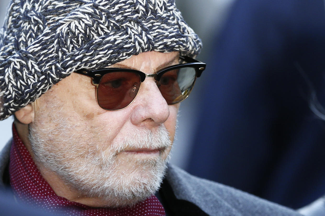 Former British pop star Gary Glitter, whose real name is Paul Gadd, arrives at Southwark Crown Court in London January 13, 2015. Glitter is charged with sexual offences involving underage girls.  REUTERS/Stefan Wermuth  (BRITAIN - Tags: CRIME LAW ENTERTAINMENT)