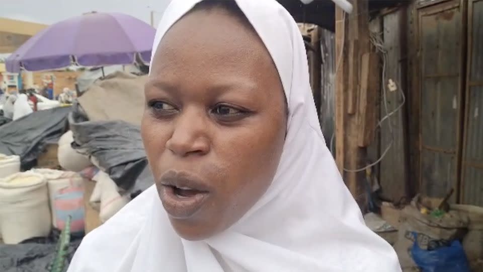 Salamatou, seen here during a trip to the Wadata market, said she was concerned about the rising price of food.  - Omar Saley/CNN