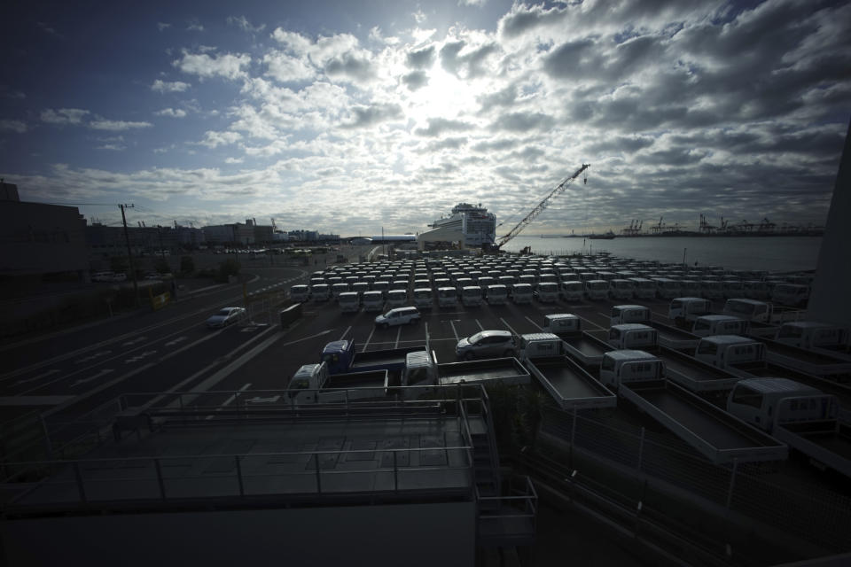 The quarantined Diamond Princess cruise ship is seen a port in Yokohama, near Tokyo, Wednesday, Feb. 19, 2020. The cruise ship begins letting passengers off the boat on Wednesday after it's been in quarantined for 14 days. (AP Photo/Eugene Hoshiko)