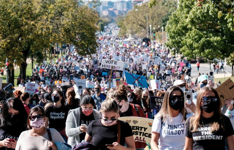 FILE PHOTO: Women's March activists participate in a nationwide protest against U.S. President Donald Trump's decision to fill the seat on the Supreme Court