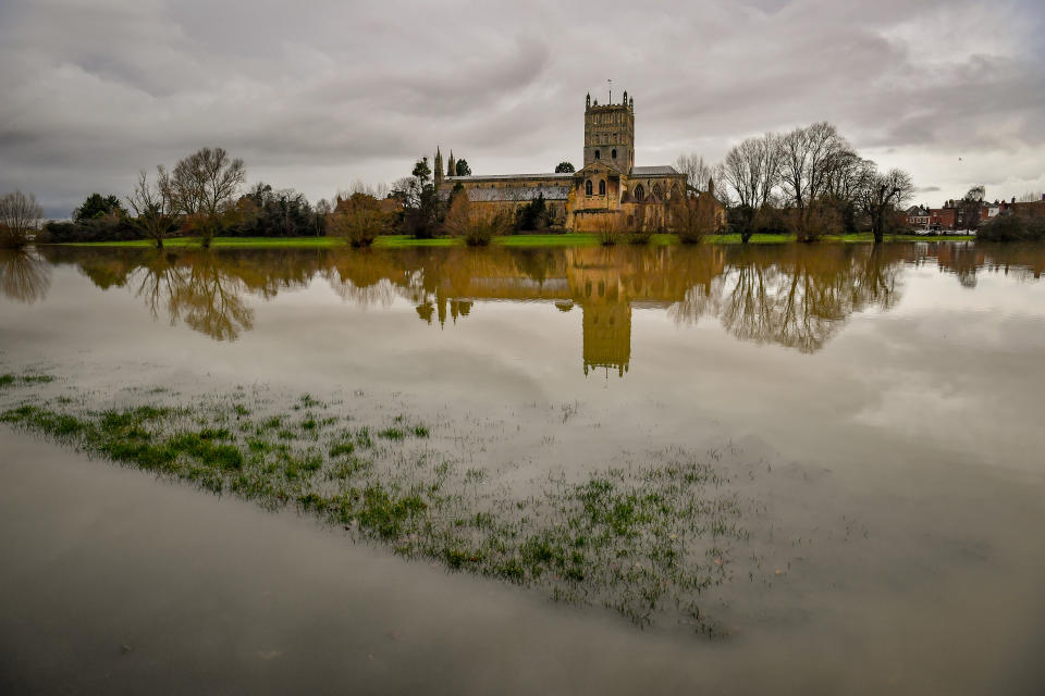 Flood waters surround Tewkesbury Abbey, where flood watches are in place with more wet weather expected in the coming days.