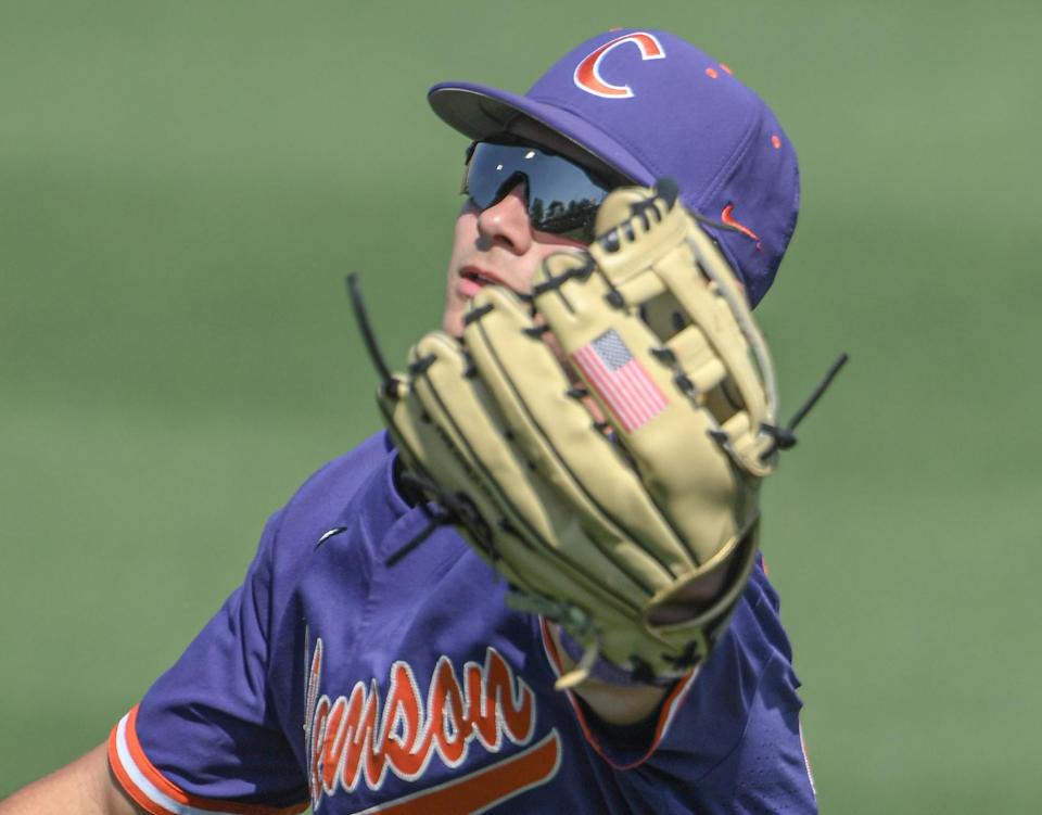 Clemson freshman Will Taylor (16) catches a ball during the top of the fifth inning at Doug Kingsmore Stadium in Clemson Friday, May 20, 2022.