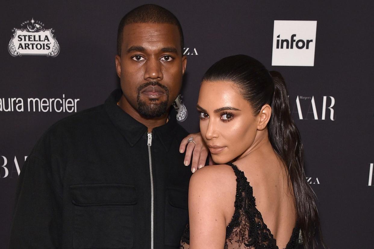 Name game: Kanye West and Kim Kardashian: Bryan Bedder/Getty