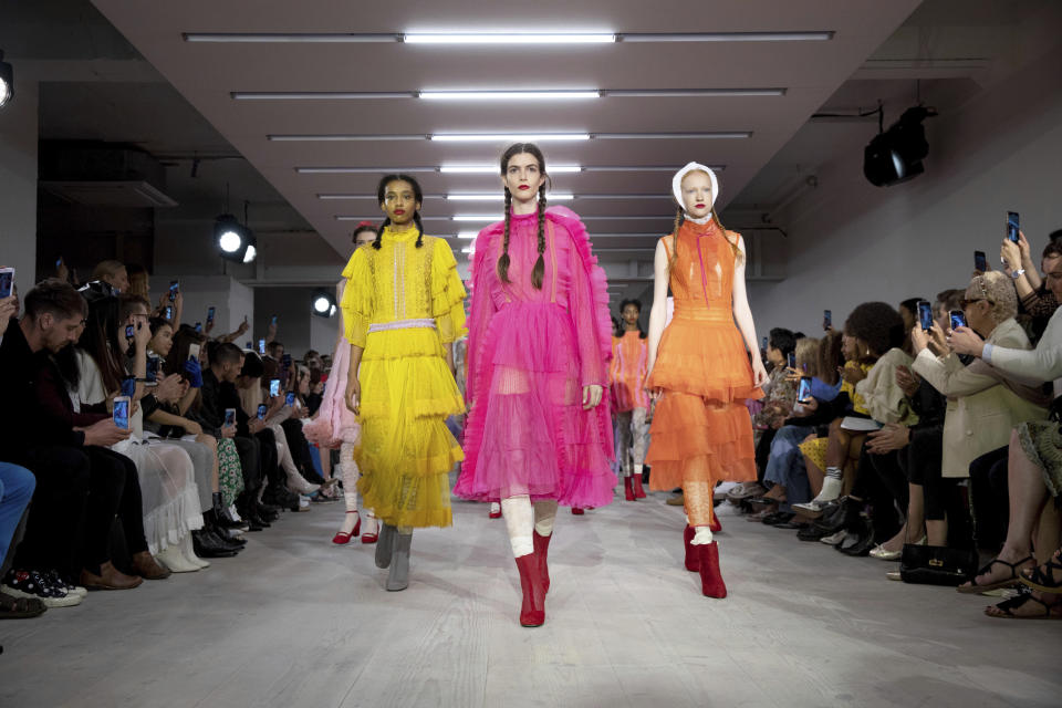 Models wear creations by Bora Aksu at the Spring/Summer 2020 fashion week runway show in London, Friday, Sept. 13, 2019. (Photo by Grant Pollard/Invision/AP)