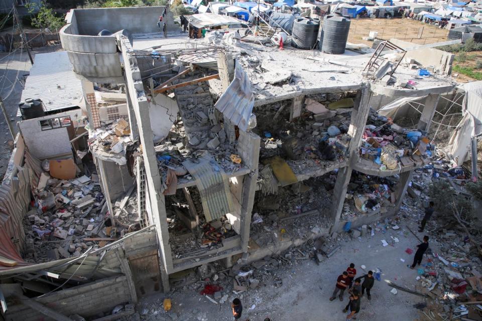 A house hit by an Israeli airstrike in Rafah (Reuters)