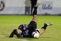 UCLA goalkeeper Lauren Brzykcy stops an Alabama shot during the first half of an NCAA women's soccer tournament semifinal in Cary, N.C., Friday, Dec. 2, 2022. (AP Photo/Karl B DeBlaker)