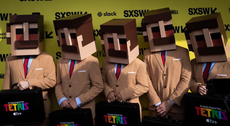 Block men pose for the cameras on the "Tetris" world premiere red carpet on March 15 at the Paramount Theatre.