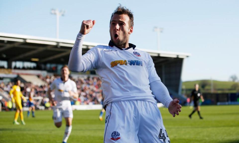 Adam Le Fondre celebrates after scoring Bolton’s second goal in their win over Shrewsbury Town. 