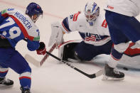 Slovakia's Libor Hudacek scores his side's second goal past Unted States' goalkeeper Alex Nedeljkovic during the preliminary round match between United States and Slovakia at the Ice Hockey World Championships in Ostrava, Czech Republic, Monday, May 13, 2024. (AP Photo/Darko Vojinovic)