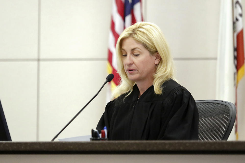 Monterey County Superior Court Judge Jennifer J. O'Keefe reads a verdict during Paul Flores' trial in Monterey County Superior Court on Tuesday, Oct. 18, 2022, in Salinas, Calif. Jurors unanimously found Flores guilty of first-degree murder of Cal Poly student Kristin Smart. (Laura Dickinson/The Tribune via AP, Pool)