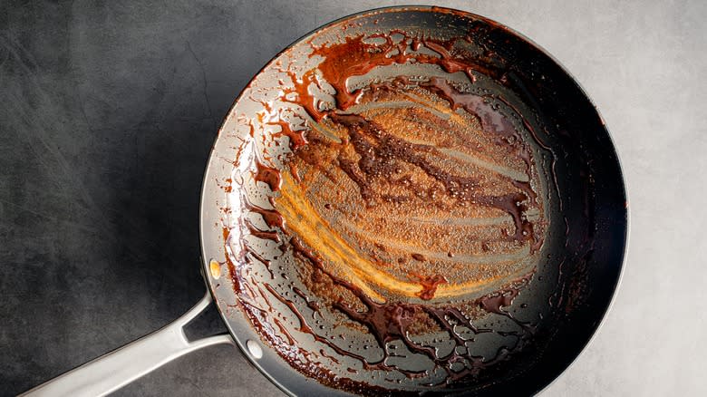 A pan with brown sauce