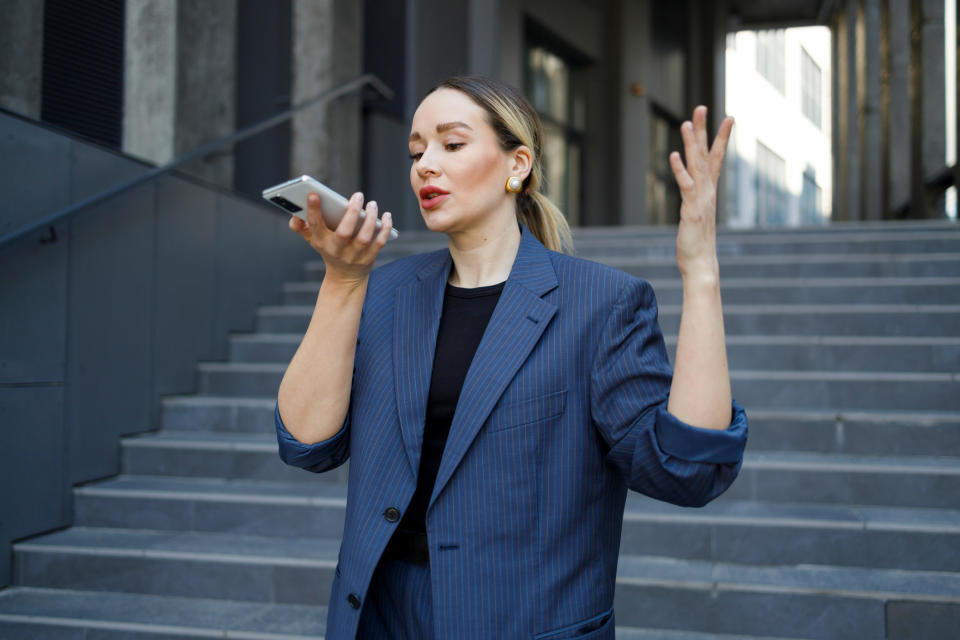 person talking into her phone