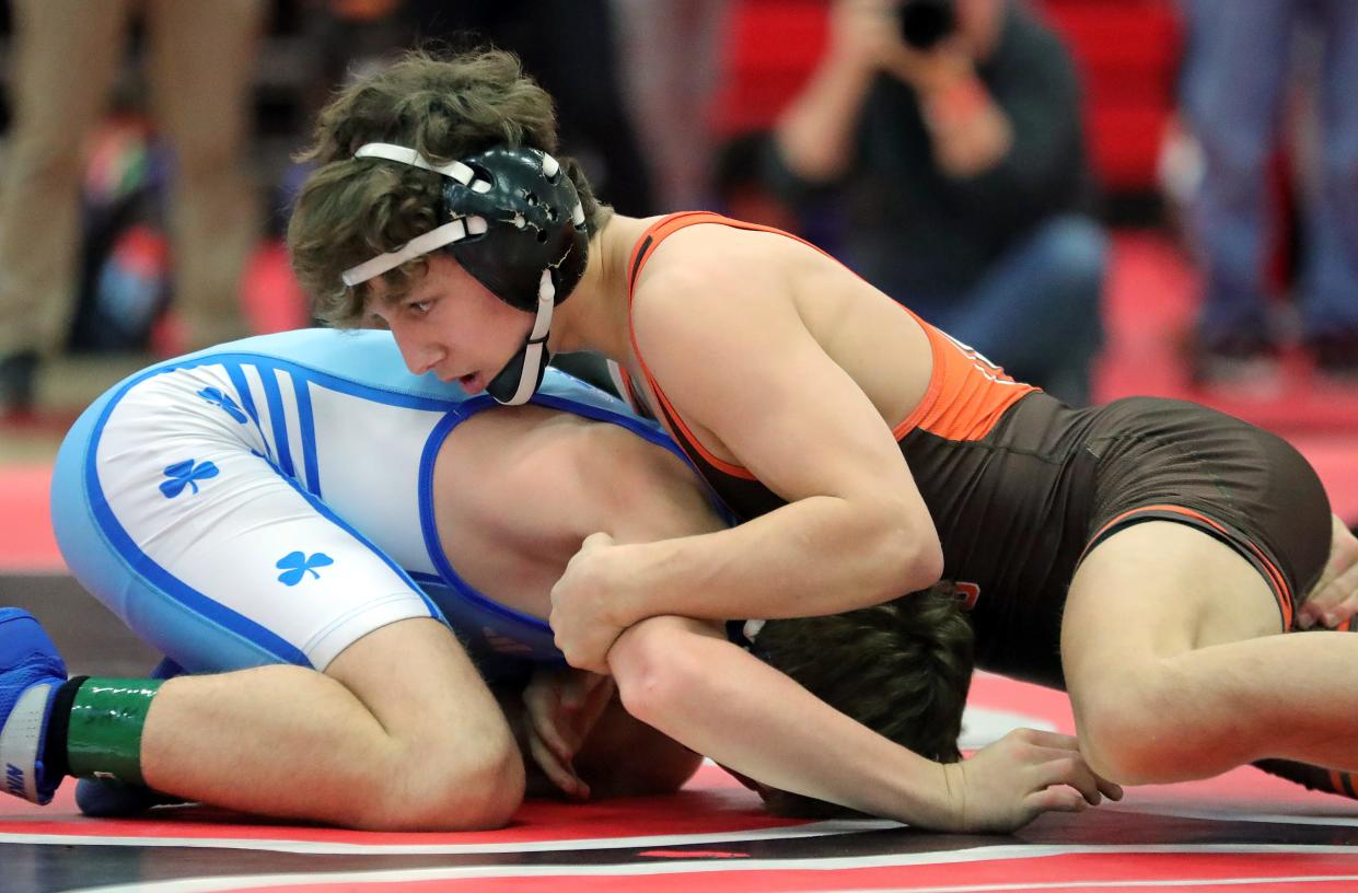 Colyn Limbert of Buckeye wrestles Mack Moscovic of Detroit Catholic Central in the 120-pound final of the Wadsworth Grizzly Invitational Tournament on Jan. 20 in Wadsworth.
