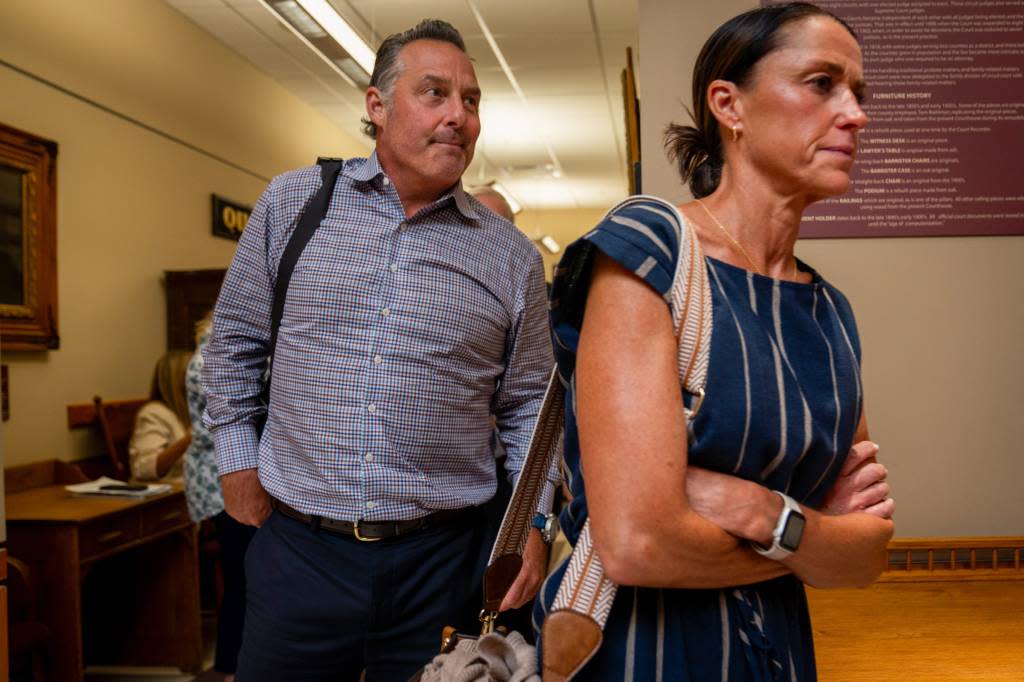 Mark Goldman and Spring Goldman leave the courtroom following a hearing concerning the custody of Elijah at the Robert T. Griffin Hall of Justice in Traverse City on Wednesday. Audrey Richardson / USA TODAY NETWORK