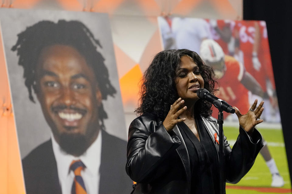 Gospel singer CeCe Winans sings during a memorial service for three slain University of Virginia football players Lavel Davis Jr., D'Sean Perry and Devin Chandler at John Paul Jones Arena at the school in Charlottesville, Va., Saturday, Nov. 19, 2022. (AP Photo/Steve Helber, Pool)