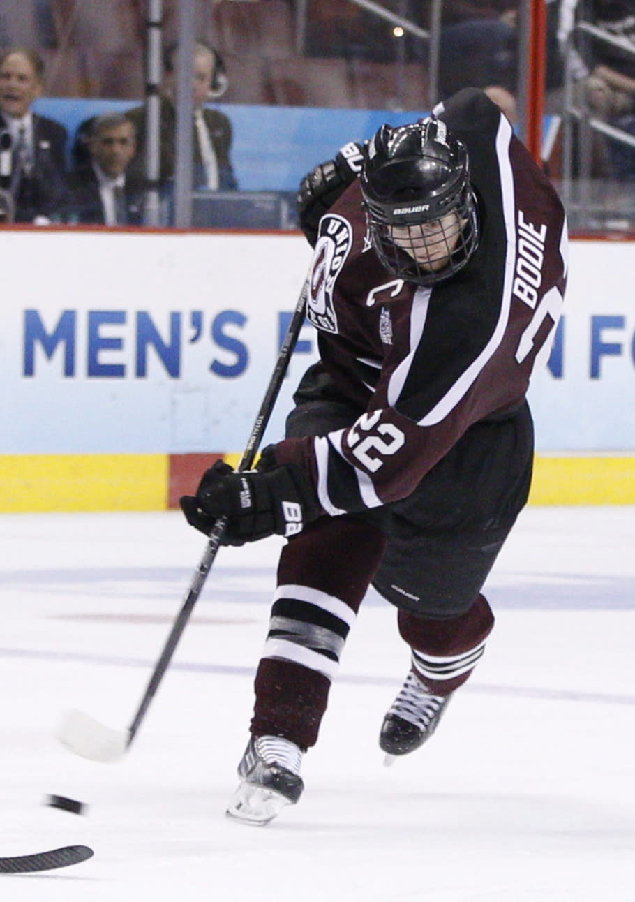 Union's Mat Bodie shoots the puck during the second period of an NCAA men's college hockey Frozen Four tournament game against Boston College, Thursday, April 10, 2014, in Philadelphia. (AP Photo/Chris Szagola)