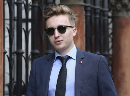 Anatoly Litvinenko, the son of murdered KGB agent Alexander Litvinenko, leaves the High Court in central London, July 28, 2015. REUTERS/Paul Hackett