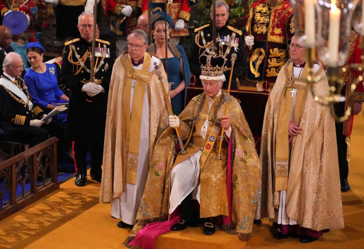 topshot britains king charles iii with the st edwards crown on his head attends the coronation ceremony inside westminster abbey in central london on may 6, 2023 the set piece coronation is the first in britain in 70 years, and only the second in history to be televised charles will be the 40th reigning monarch to be crowned at the central london church since king william i in 1066 outside the uk, he is also king of 14 other commonwealth countries, including australia, canada and new zealand camilla, his second wife, will be crowned queen alongside him and be known as queen camilla after the ceremony photo by aaron chown pool afp photo by aaron chownpoolafp via getty images