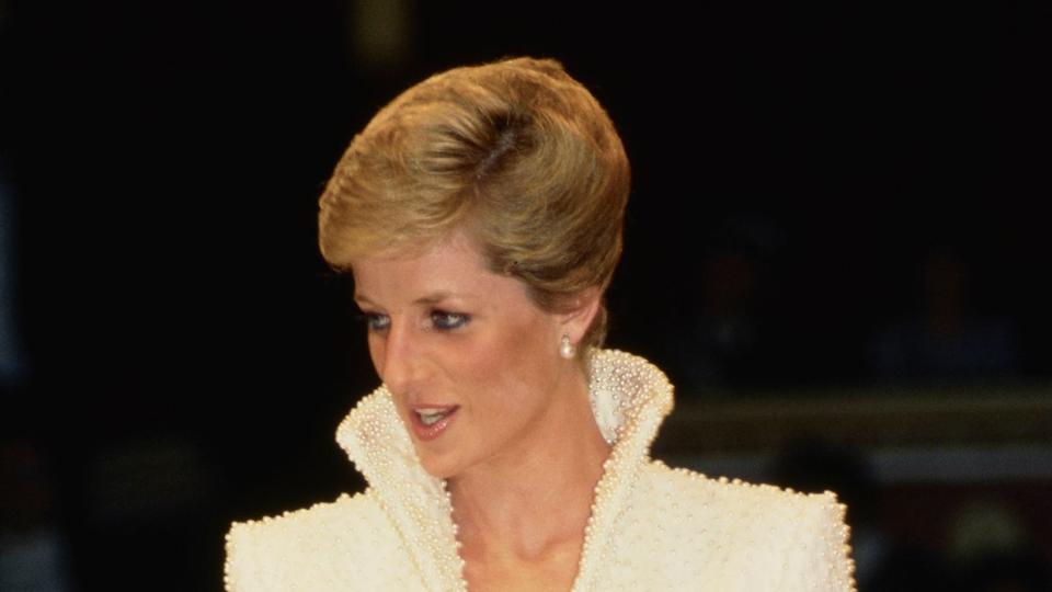 Diana, Princess of Wales (1961 - 1997) at the first British Fashion Awards at the Royal Albert Hall in London, 17th October 1989. She is wearing a white gown by Catherine Walker with a waist-length jacket