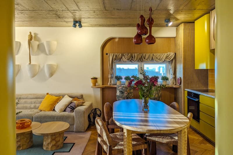 Dining table in retro inspired home.