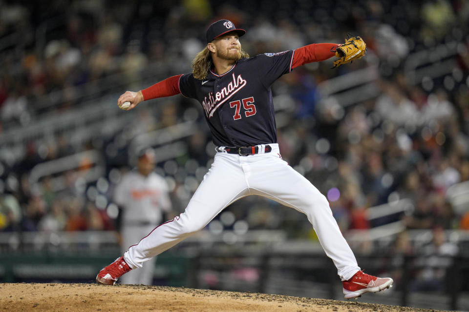 Washington Nationals relief pitcher Hobie Harris throws to a Baltimore Orioles batter during the ninth inning of a baseball game at Nationals Park, Wednesday, April 19, 2023, in Washington. The Orioles won 4-0. (AP Photo/Jess Rapfogel)