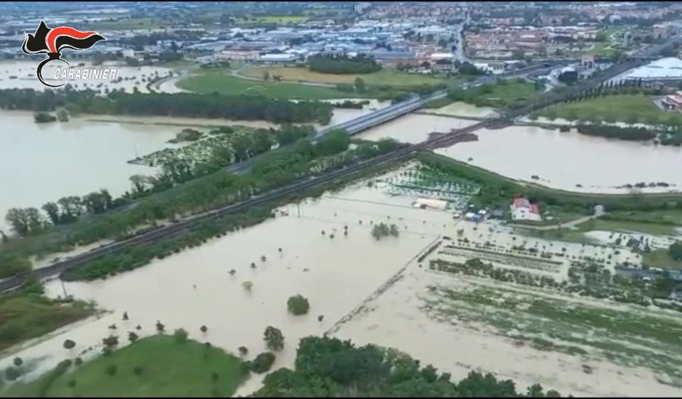 This photo provided by the Italian Carabinieri police shows flooded fields in the northern Italian region of Emilia Romagna, Wednesday, May 17, 2023.