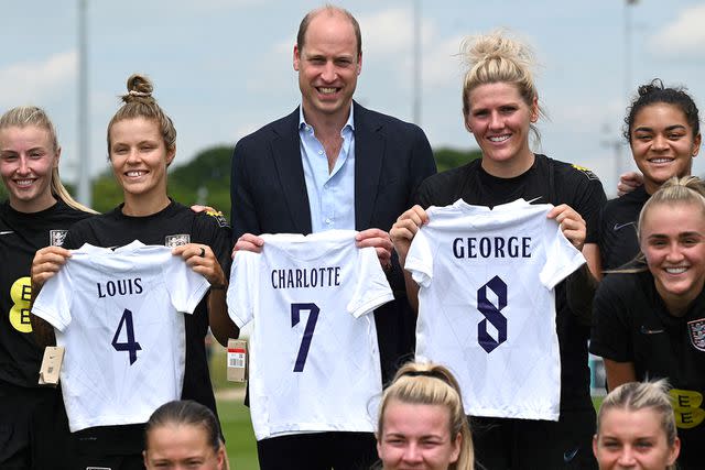 PAUL ELLIS/AFP via Getty Images Prince William with soccer jerseys for his children in 2022
