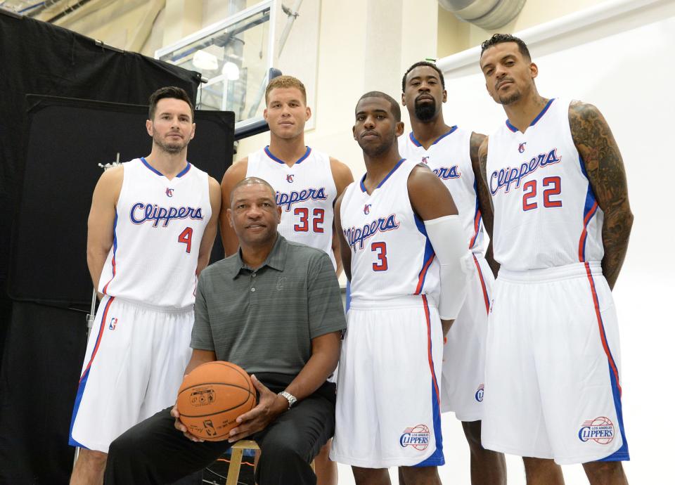 J.J. Redick, right, played for Doc Rivers, center, with the Los Angeles Clippers.