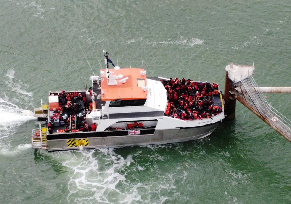 A group of people thought to be migrants are brought in to Ramsgate, Kent, onboard a Border Force vessel following a small boat incident in the Channel (Gareth Fuller/PA) (PA Wire)