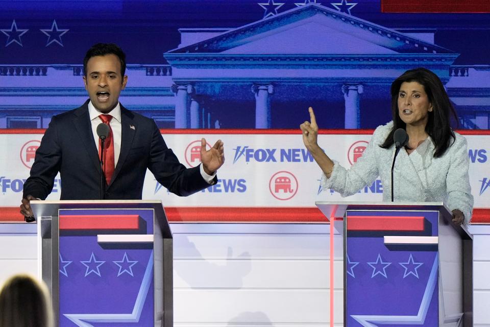 Businessman Vivek Ramaswamy and former U.N. Ambassador Nikki Haley speak during a Republican presidential primary debate hosted by FOX News Channel Wednesday, Aug. 23, 2023, in Milwaukee. (AP Photo/Morry Gash)