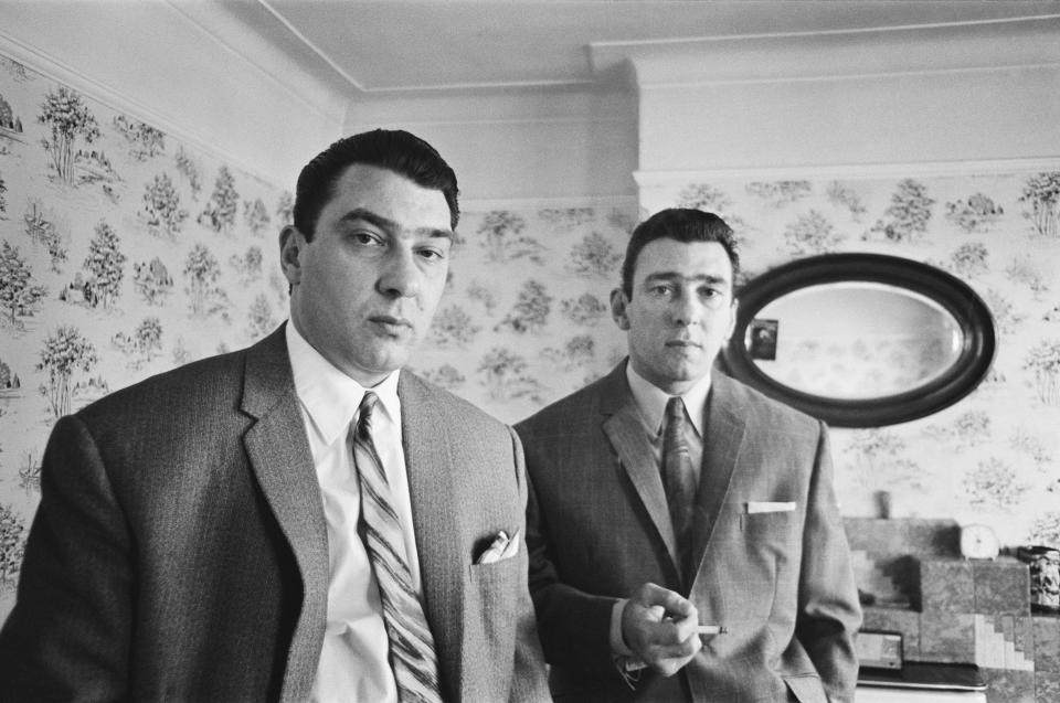 Ronald and Reginald are pictured here at home after speaking with authorities about the Bling Beggar Pub shooting in 1966.