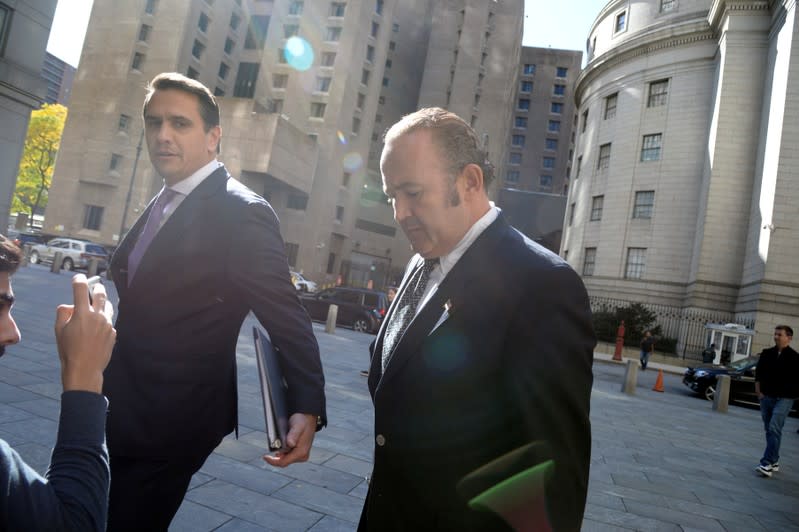 Russian-born businessman Igor Fruman leaves after his arraignment at the United States Courthouse in the Manhattan borough of New York