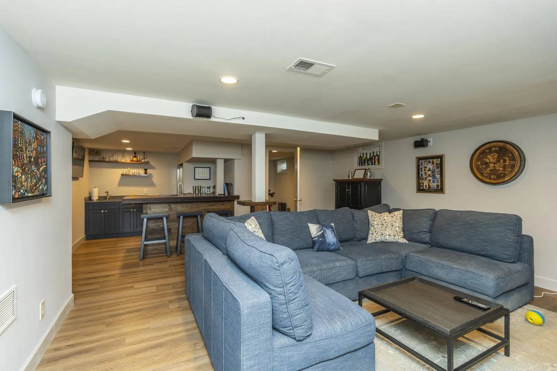 The basement den at 403 Queensway Drive, complete with a bourbon bar. Matt Huber/Team Pannell Real Estate